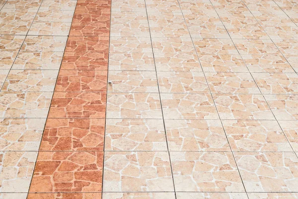 Old brown ceramic tile floor perspective view