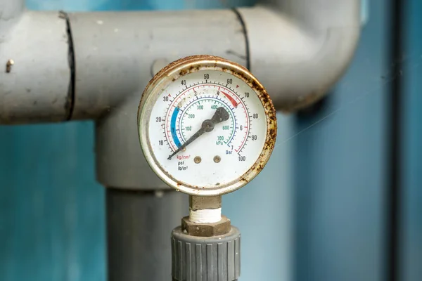Gage show zero on blurred pipe background — Stock Image Gage Show Zero Blurred Pipe Background Stock Image