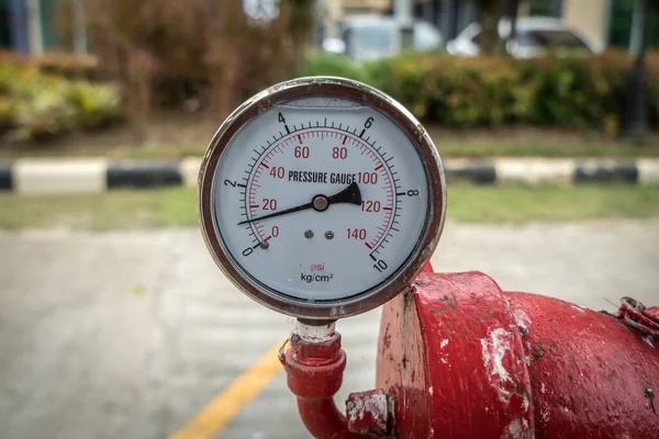 Gage on red fire hose — Stock Image Gage Red Fire Hose Royalty Free Stock Images