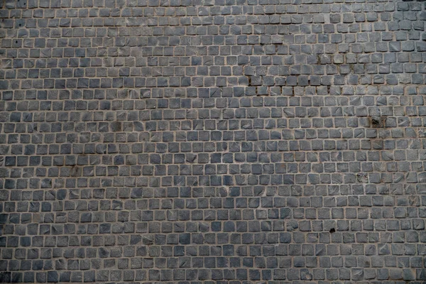 黒い石のブロック床のパターン — ストック写真