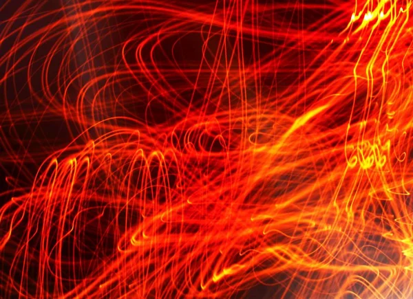 Lumineux feu orange lumière incandescentes lignes douces fusée éclairante fond de conception flou — Photo