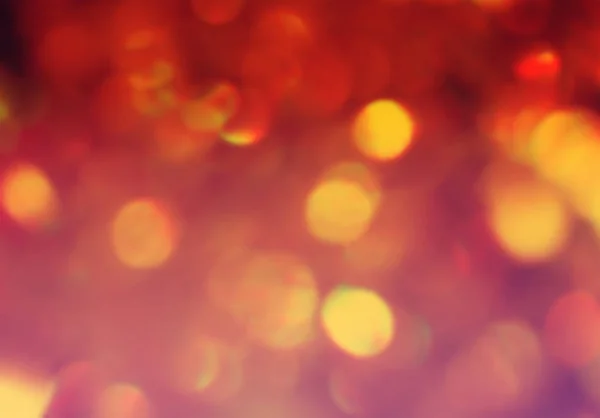 Heldere warme toned rood oranje bokeh mooie feestelijke textuur achtergrond — Stockfoto