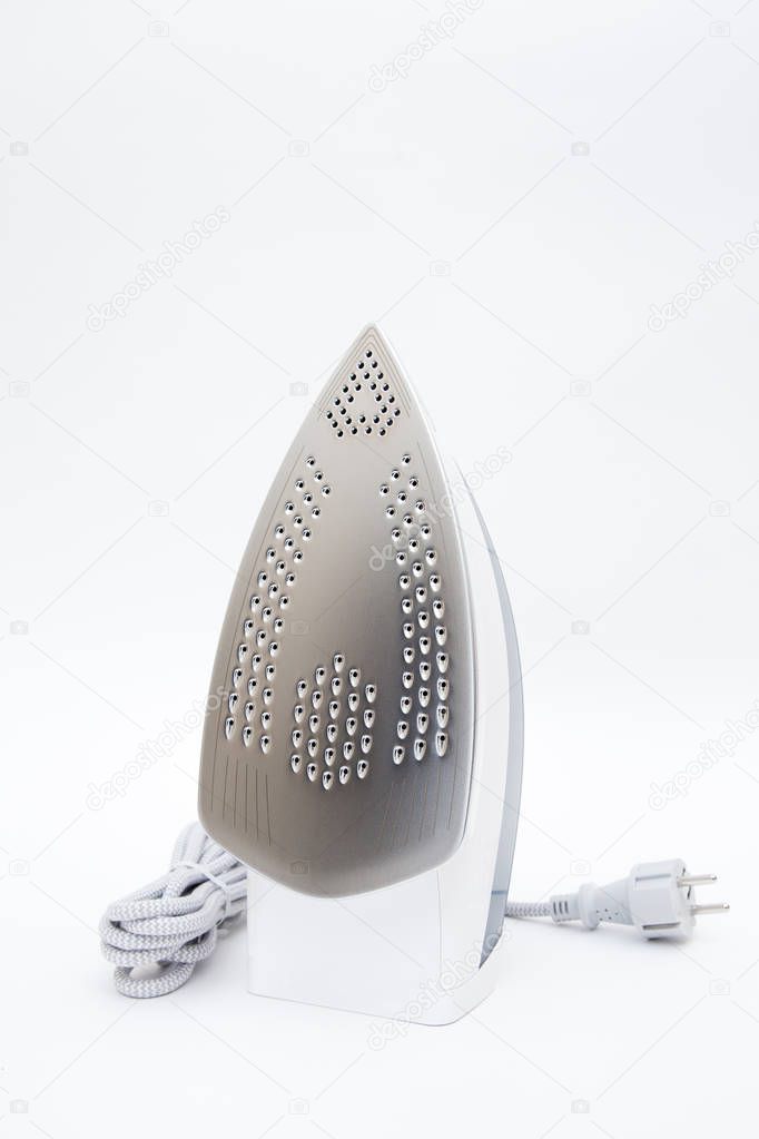Electric iron with open handle isolated on white background 