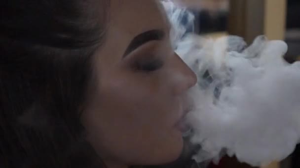 Woman Smoking Shisha Hookah Lounge Blows Smoke — Stock Video