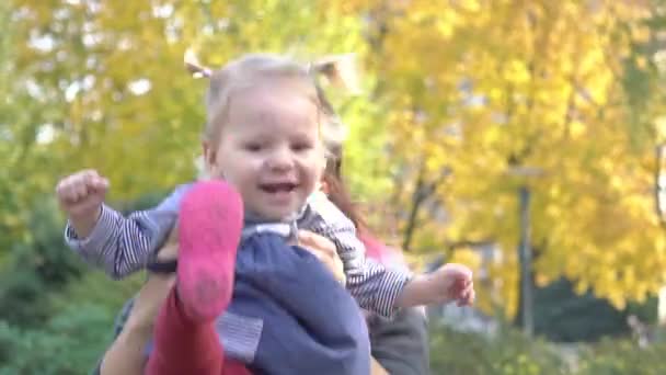 Real Time Mother Baby Playing Autumn Park — Stock Video