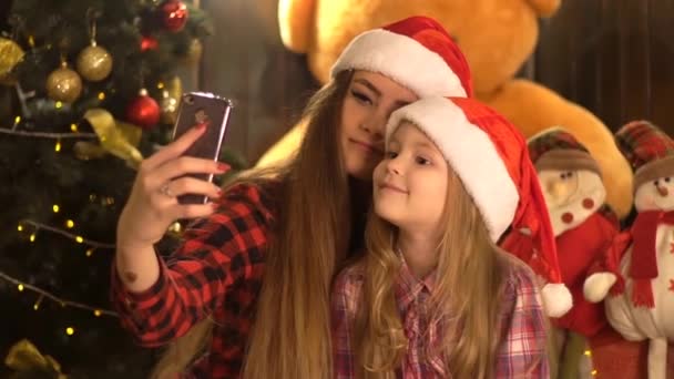 Cute Girls New Year Make Selfie Phone Christmas Background — Stock Video