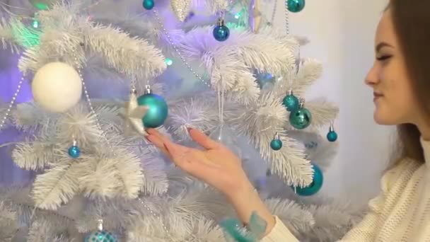 Happy Attractive Young Woman Touching Blue Christmas Balls Decorated — Stock Video