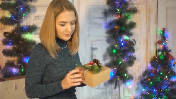 Happy Woman Wearing Santa Hat Holding Gifts Christmas New Year — Stock Video