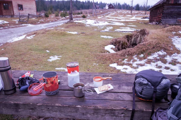Preparation of food in the campaign. Eat in the mountains. Top.