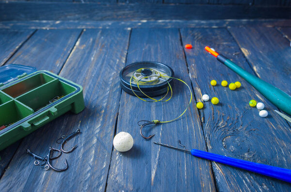 Making carp bait with a boil. Carp Leader. Wagler, boilies, carp hook. Sport fishing. Carp fishing.