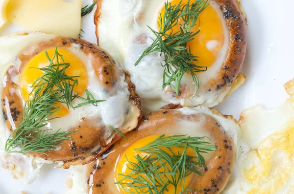 Three Fried Eggs Eggs Fried Bread Yolks Greens — Stock Photo, Image