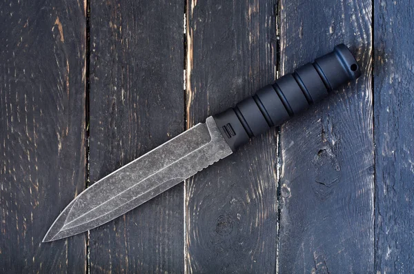 A military knife for attack and self-defense. Knife of military purpose.