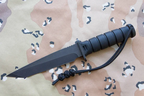 Tactical knife. Military knife in the center of the frame.