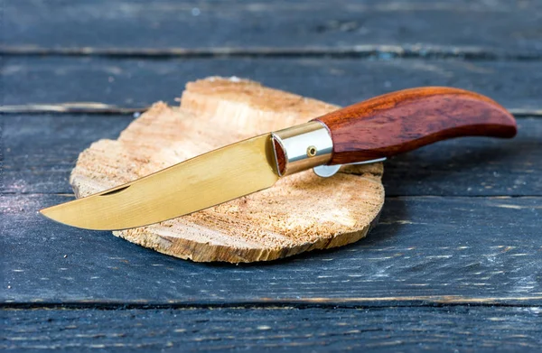 Classic folding knife with a wooden handle. Penknife.