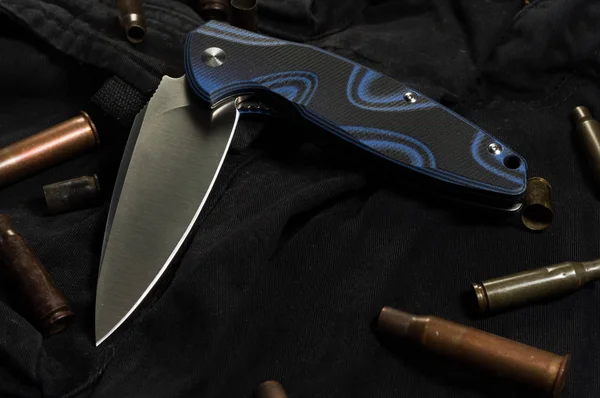 Folding knife. Knife in a half-complicated position.