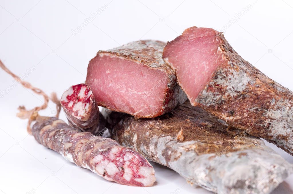 Meat platter. Meat and sausage. Dried meat with mold.