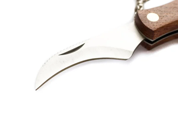 Couteau en forme de faucille. Un couteau tranchant avec une scie . — Photo