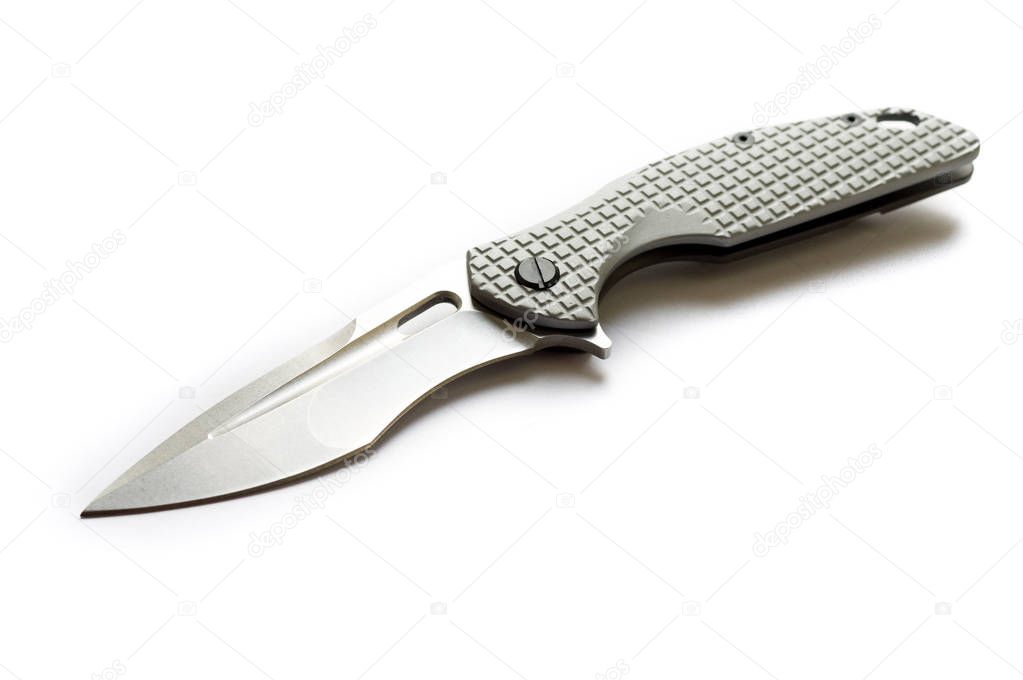 Knife on a white background located diagonally at an angle.