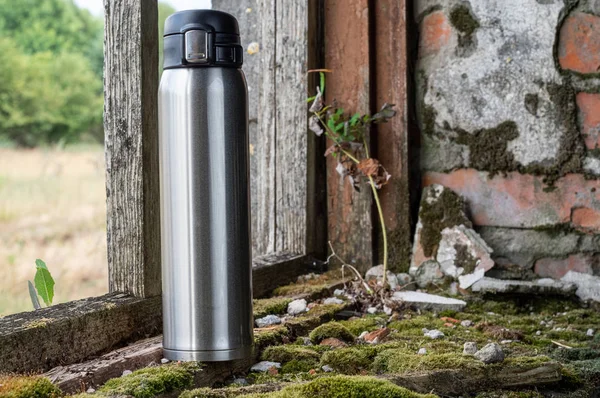 Steel bottle. Iron bottle for drinks. Thermos.