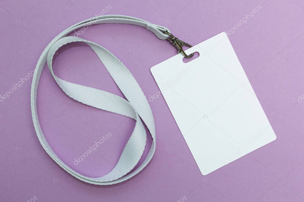 Blank badge with lanyard on purple background, empty space for text.