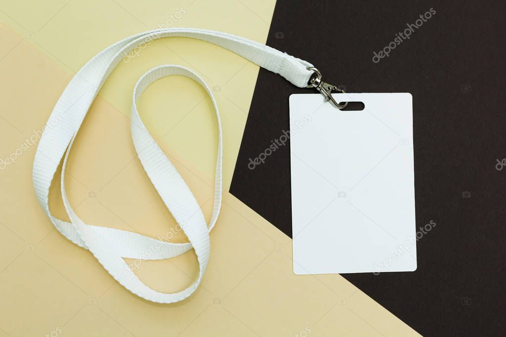 Blank ID card / badge with white belt isolated over background. Space for text.