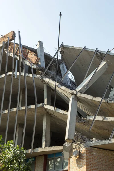 Destroyed structure, broken floors. Vertically.