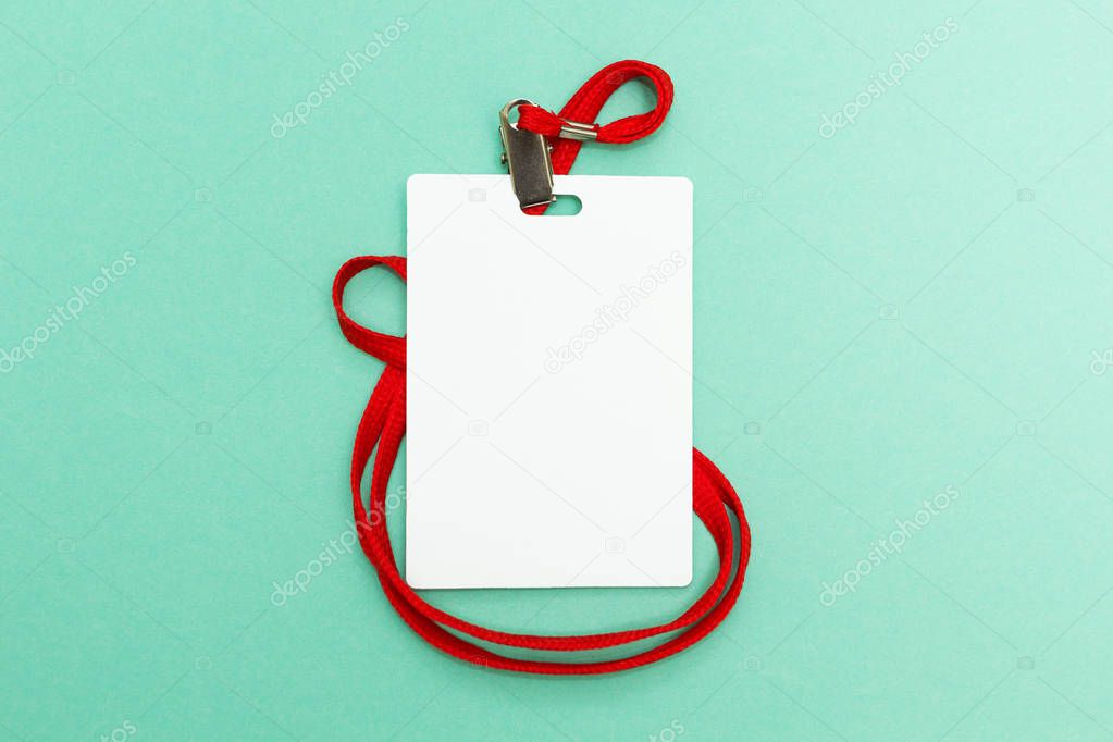 Blank tag id on a green background. Empty id card mockup.