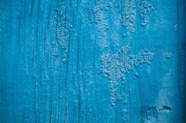 Eski arka plan mavi renk ahşap bir surfac üzerinde kırık boya