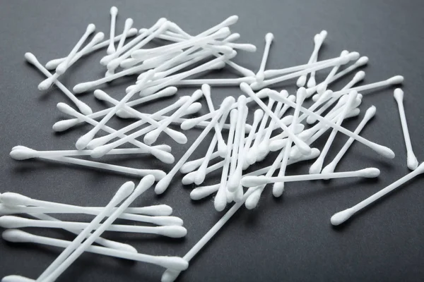 Soft cotton swabs isolated on a black background. Hygiene and a