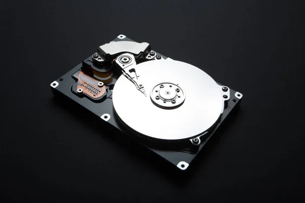 Server hard drive on a black background. Storage of personal dat