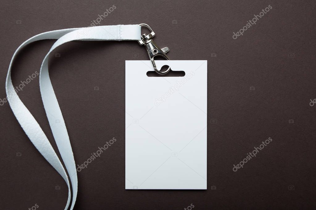 Empty blank badge identification card with white neckband isolat