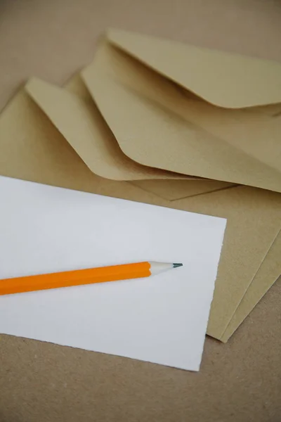 Blank letter paper for a brown vintage envelope.