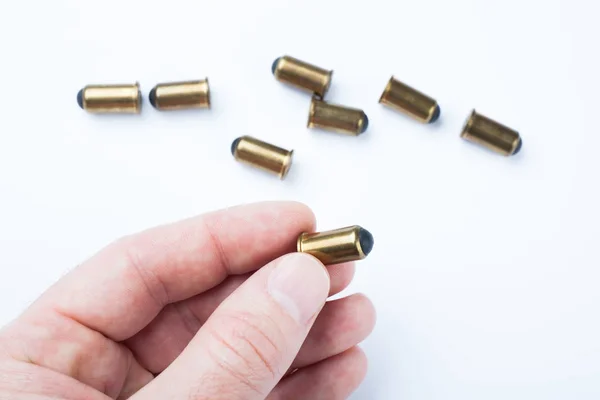 Bullets for a gun on a white background. — Stock Photo, Image