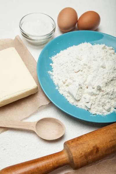 A set of ingredients: flour, eggs, butter, sugar. — Stock Photo, Image