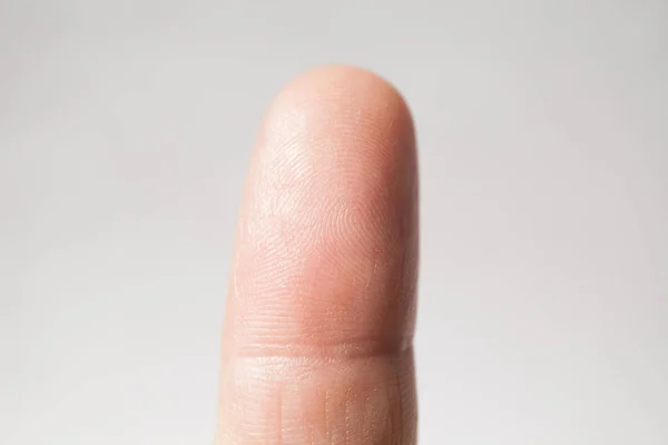Close-up, fingerprint on a gray background. — Stock Photo, Image