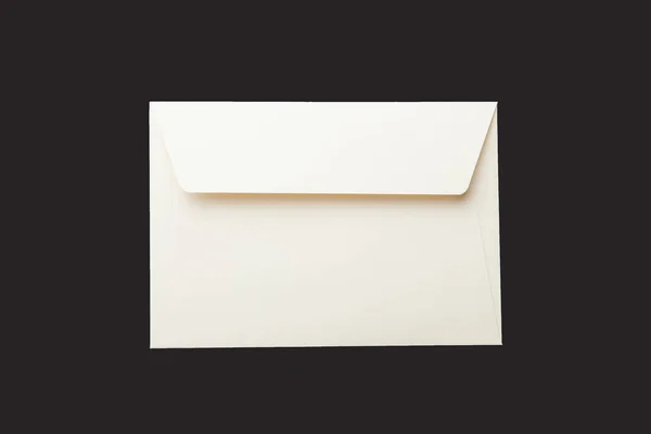 Empty envelope on a black background. Mock up. — Stock Photo, Image