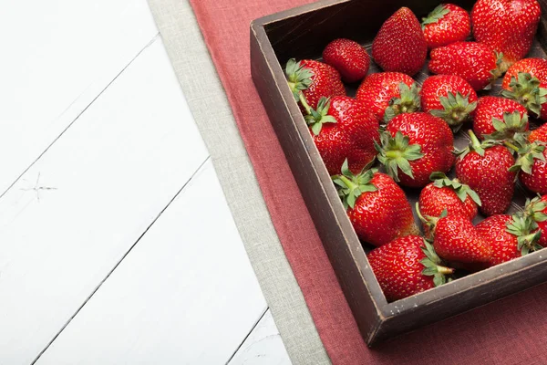 Agricultural alluring strawberries. Delicious food, age rustic background. Copy space for text. — Stock Photo, Image