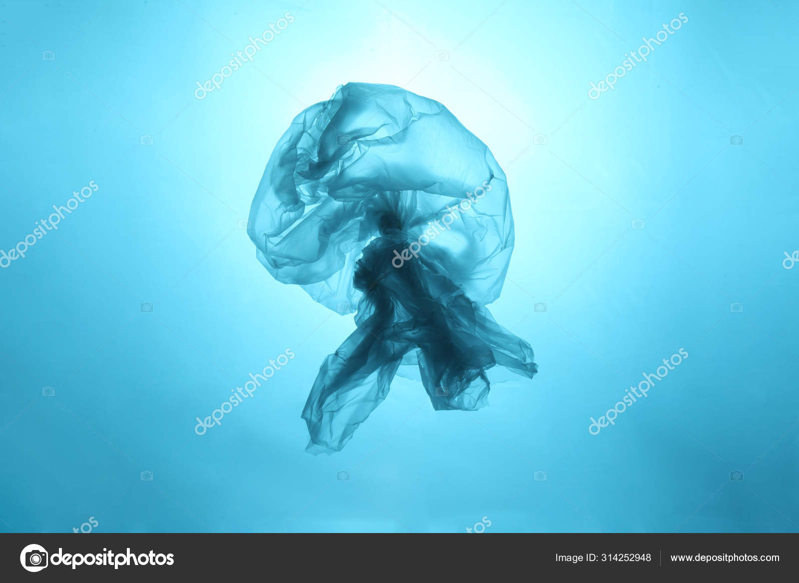 Drifting plastic bag in the form of a jellyfish in the world ocean. Concept  of technogenic pollution of the planet. — Stock Photo © LIIMIT #314252948, image size:1600x1167