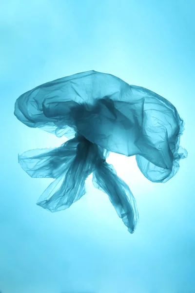 Marine debris, ocean pollution. Plastic bags are killing the world. Used plastic bag in the form of a jellyfish.