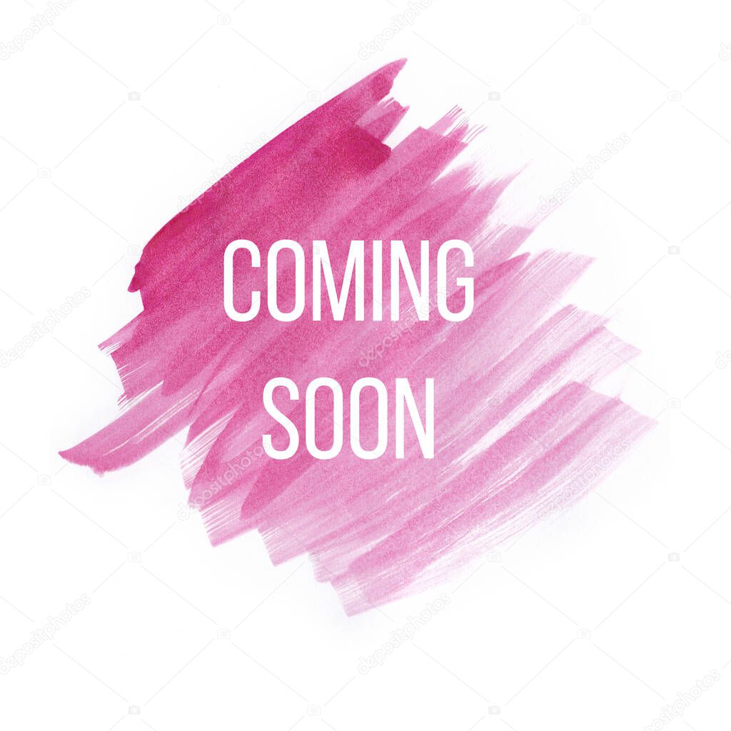 Coming soon on pink watercolor brush strokes on white background.