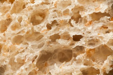 Makro ekmek dilimi. Kahverengi fırın yemeği, tahıllı somun ekmek..