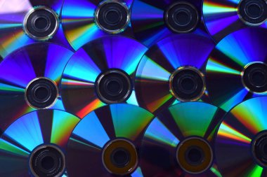 Işıklı Dvd disklerin ve Cd'lerin arka planı.
