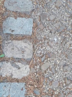 Bir duvarın taş dokusunun arka planı.