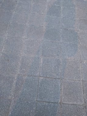 Kaldırımın taş karolarının arka planı.