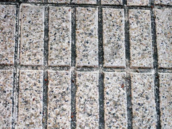 Gray street sidewalk tiles.