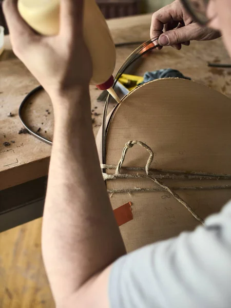 Luthier Install Binding on a guitar. — Stock Photo, Image