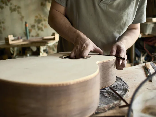 Luthier Install Binding on a guitar. — Stock Photo, Image