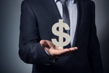 el bir dolar sembolü tutar.