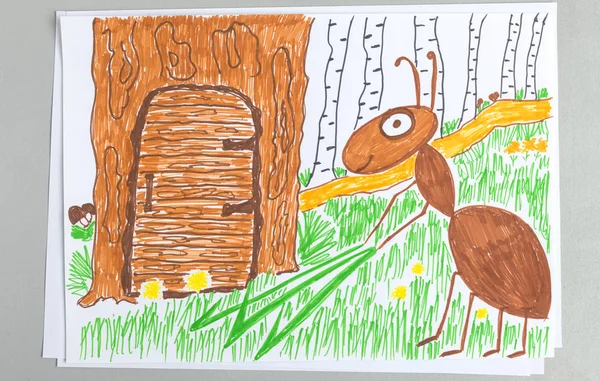 Kid drawing of ant holding green blade of grass near door of his house in tree in forest or park - cute colorful felt-tip pen child scribble of brown insect carrying greenery.