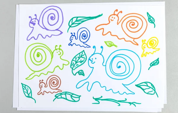 Kid drawings set of different snails and plant leaves isolated on white background - colorful outline child scribble of cute slimy animals with spiral shell and greenery collection.